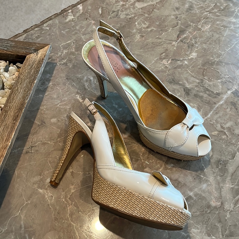 White patent bow heels